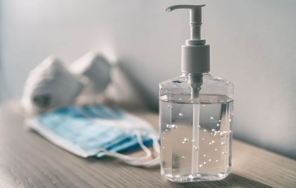 Hand sanitizer and masks to reduce spread of COVID-19